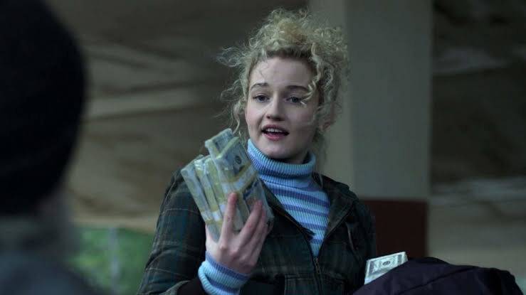 . According to Variety, Julia Garner, known for “Inventing Anna” and “Ozark”, was chosen as a favorite among Florence Pugh, Alexa Demie, Odessa Young, Bebe Rexha and Sky Ferreira. (Photo: Netflix release)
