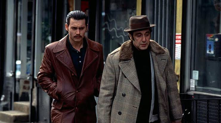 Donnie Brasco (1997). The actor plays police officer Joe Pistone, who under the alias of Donnie Brasco befriends one of the oldest and most well-known mobsters in the region, Benjamin Ruggiero (Al Pacino). The friendship between the two grows and jeopardizes both Pistone's personal life and his mission to dismantle the criminal group. (Photo: Sony Pictures release)