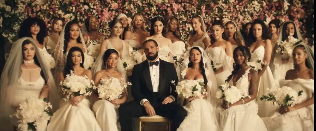 In the video, Drake appears getting ready to get married, but the surprise is that his wedding is with 23 brides. (Photo: Youtube release)