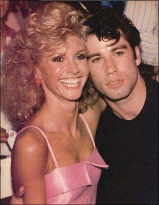 According to the book about Olivia's life, she and Travolta flirted backstage at Grease. (Photo: Instagram)