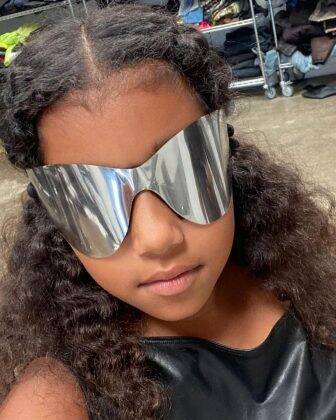 In another published photo, North appears with futuristic silver sunglasses from the rapper's collection. (Photo: Instagram release)