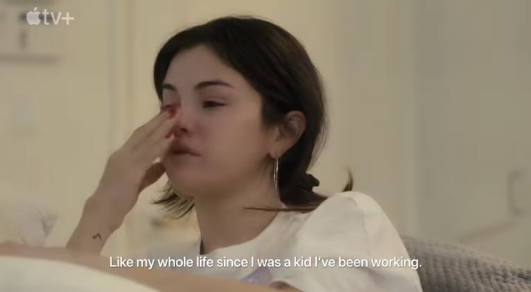 Diagnosed with Lupus in 2015, the footage shows Gomez crying and receiving medical treatment, as well as her depression and anxiety. 'My Mind & Me' has been secretly developed for six years, directed by Alek Keshishian, the same as in “Madonna: Truth or Dare” (1991). (Photo: Apple TV Plus release)
