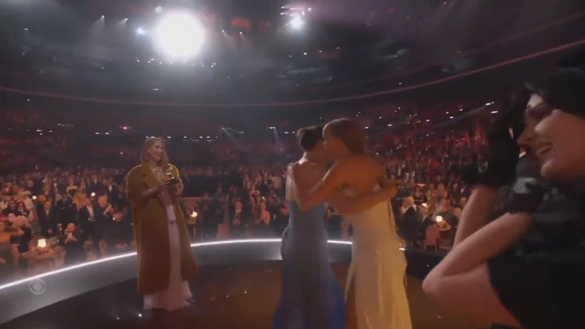After she announced Taylor as the winner, the “Anti-Hero” singer took to the stage and hugged warmly with her collaborators Jack Antonoff and Lana Del Rey before collecting her trophy from the music legend.(Photo: X)